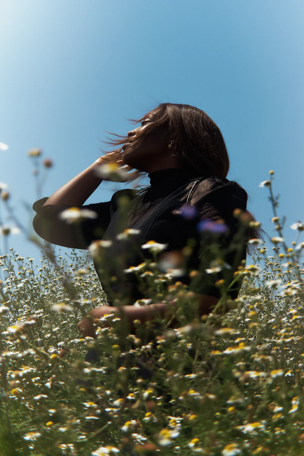 Woman in Wildflower Field