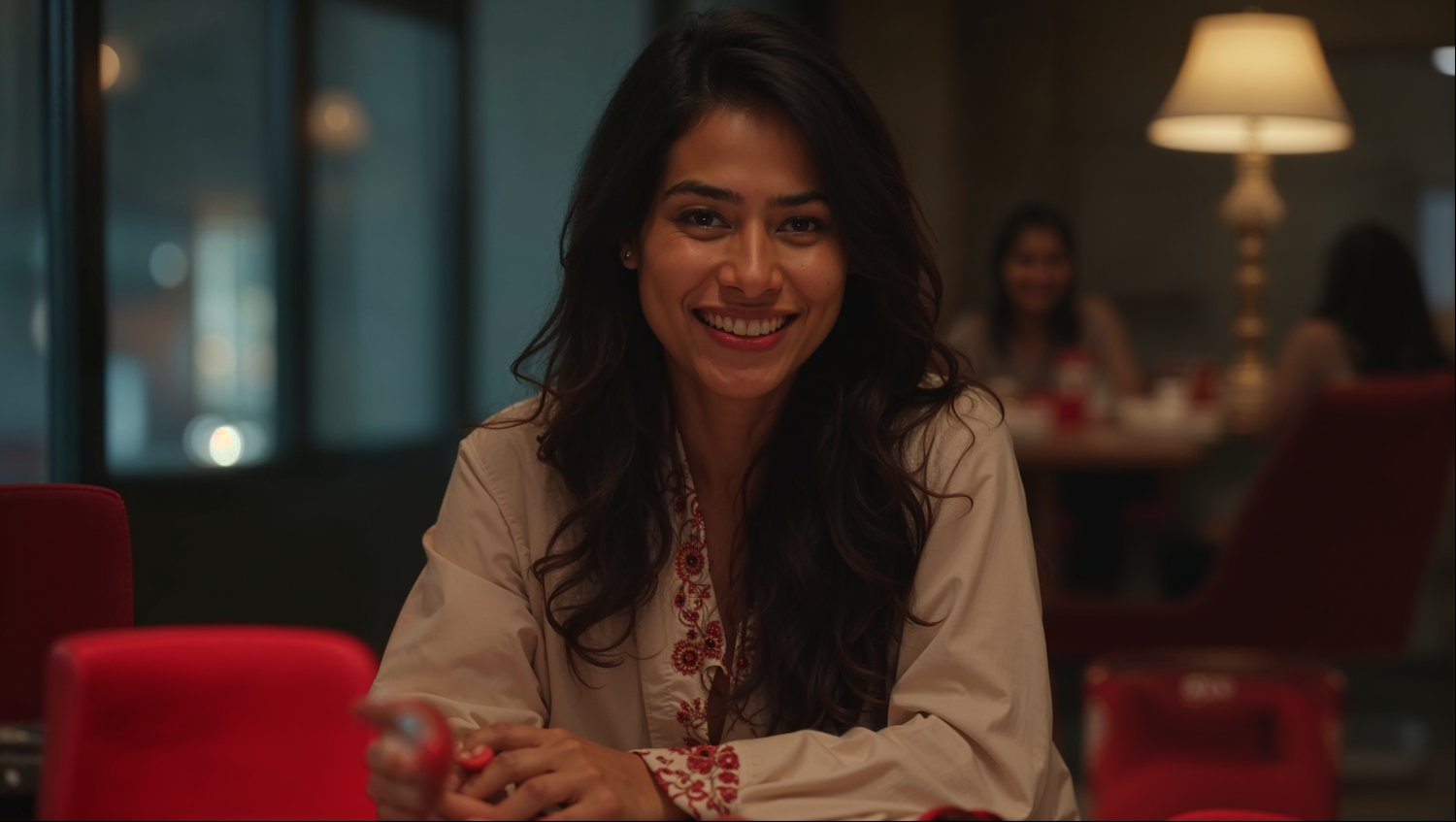 Smiling Woman in Embroidered Top