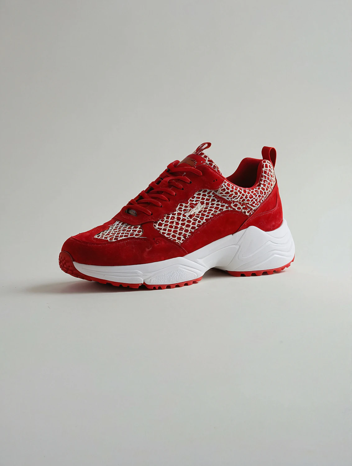 Ember Red suede sneaker on a white sole