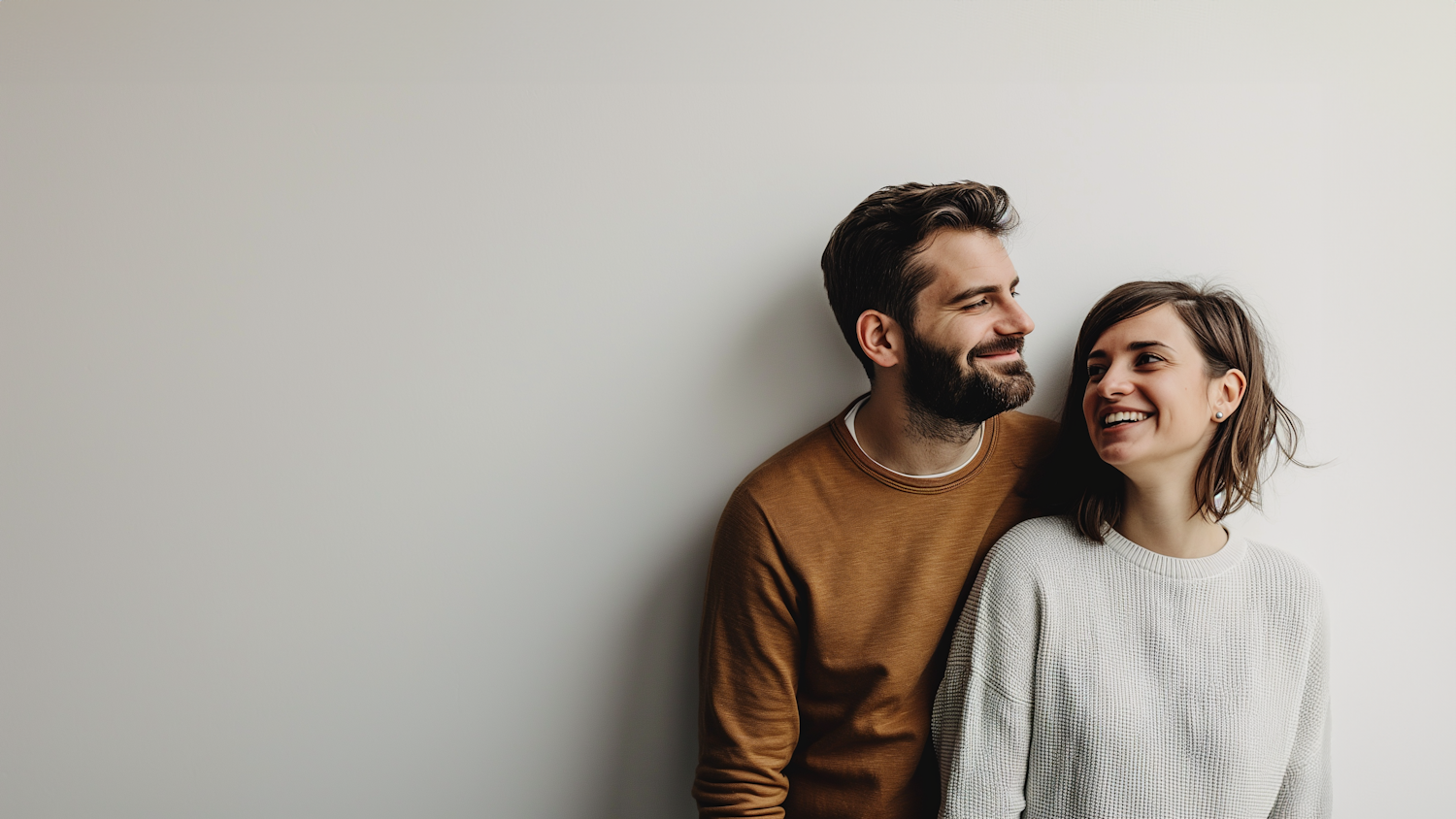 Affectionate Couple in Neutral Tones