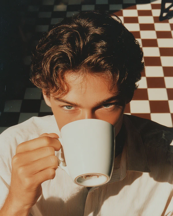 Person with Mug and Shadows