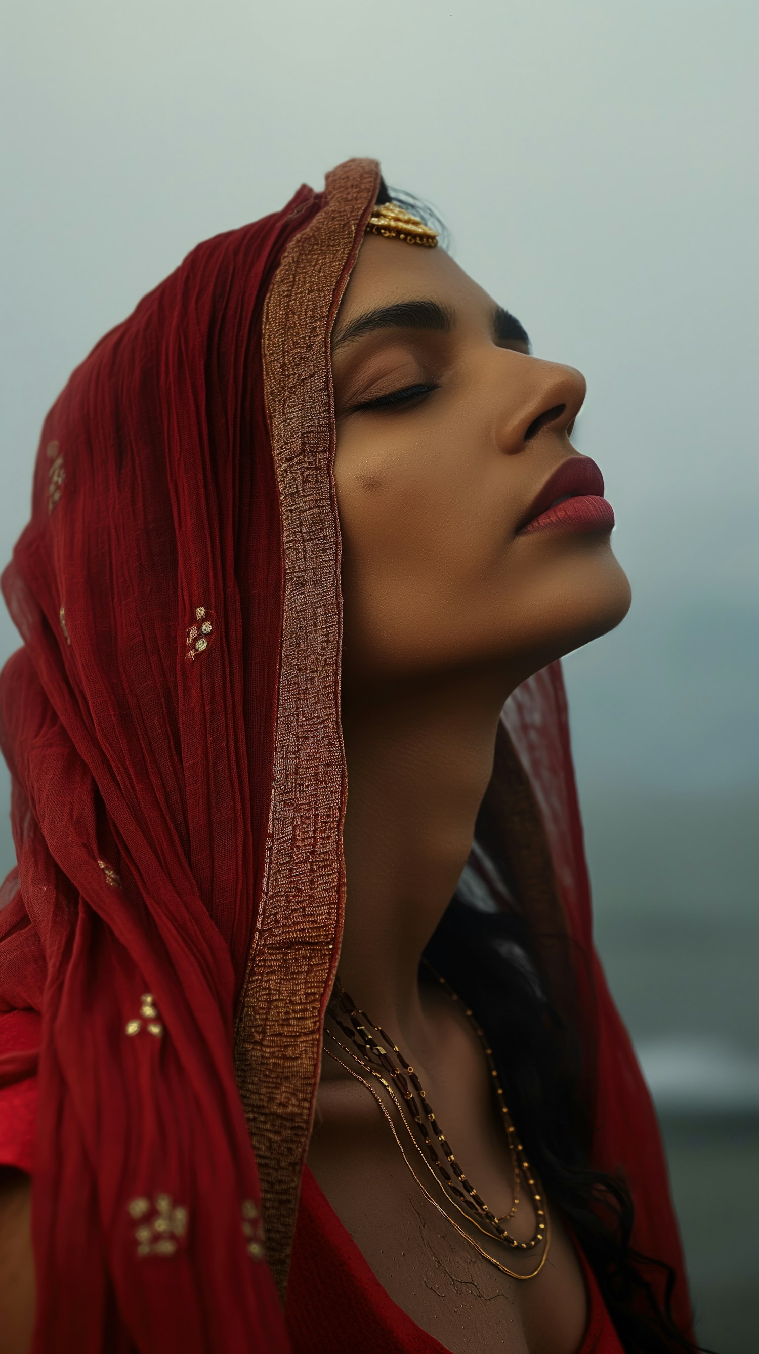 Serene Portrait with Embroidered Headscarf