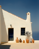 Mediterranean Building with Terracotta Pots