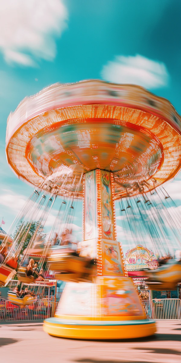 Spinning Swing Ride at Amusement Park