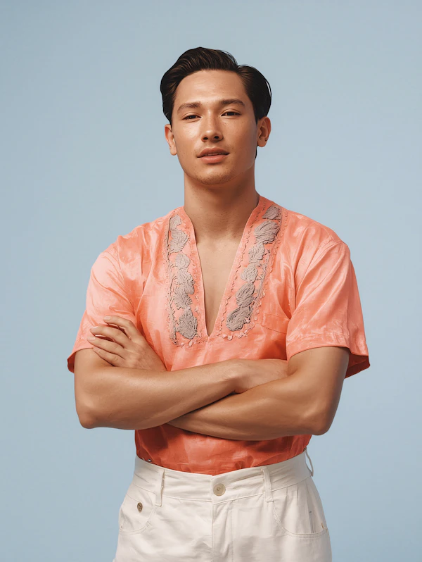 Man in Coral Shirt