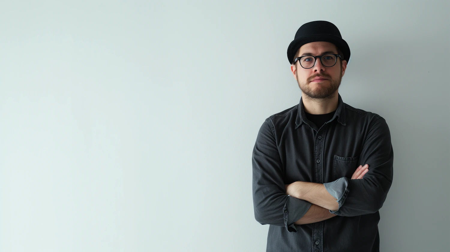 Theo Brandt photographed against a plain grey background