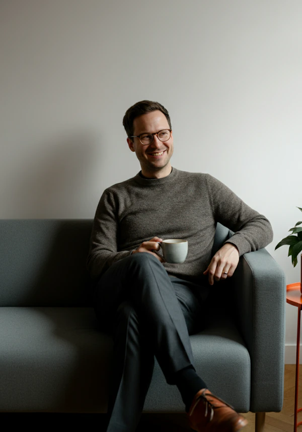 Man Relaxing on Sofa