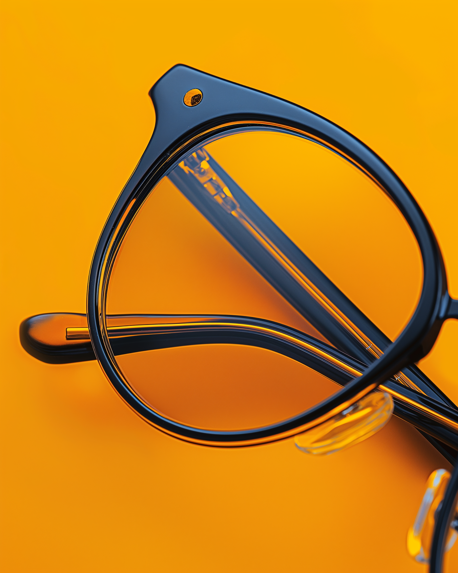 Blue Framed Eyeglasses on Orange Background