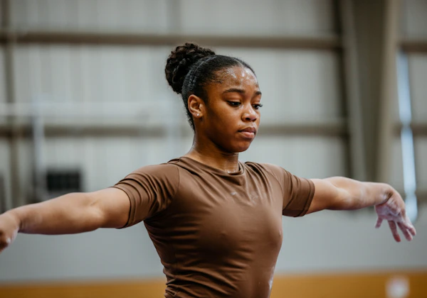 Focused Gymnast in Action