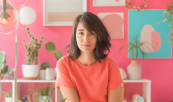 Thoughtful Young Woman in Vibrant Setting