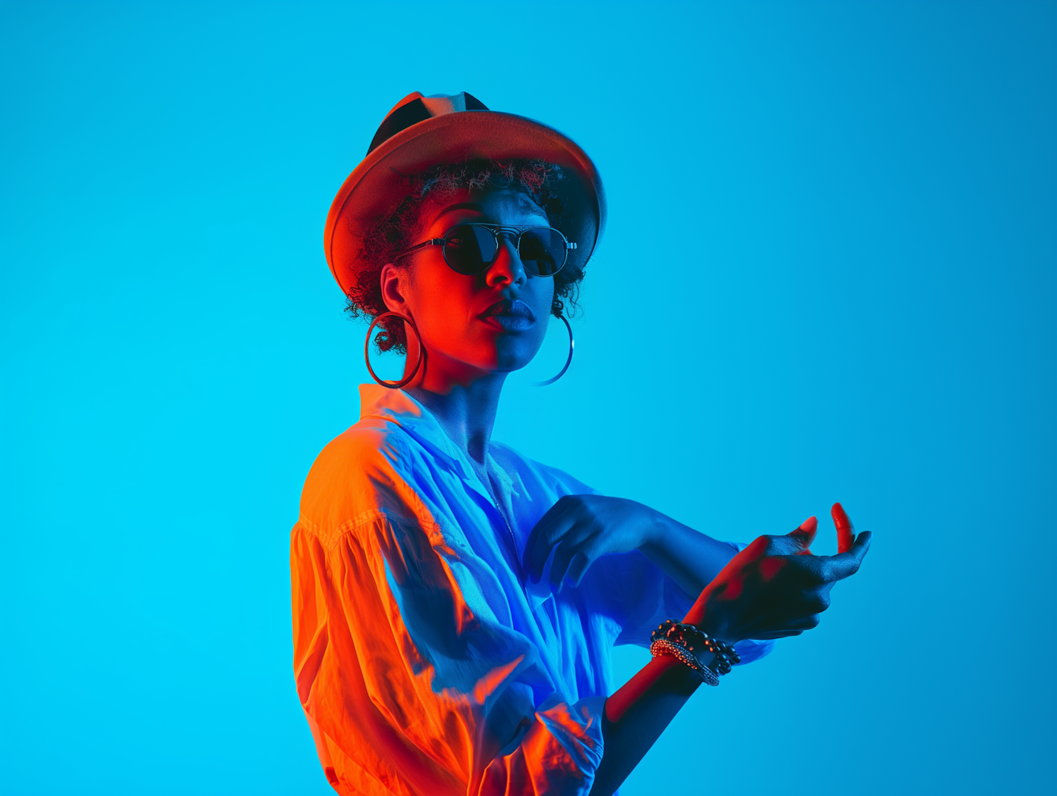 Stylish Woman in Fedora with Contrasting Red and Blue Lighting