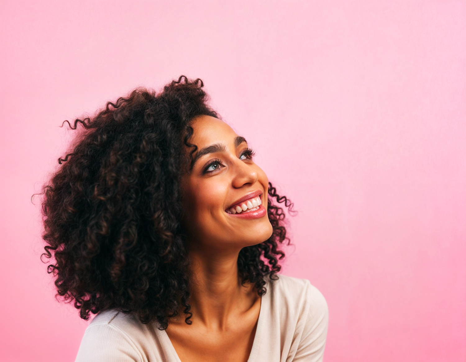 Joyful Woman Against Pink Background