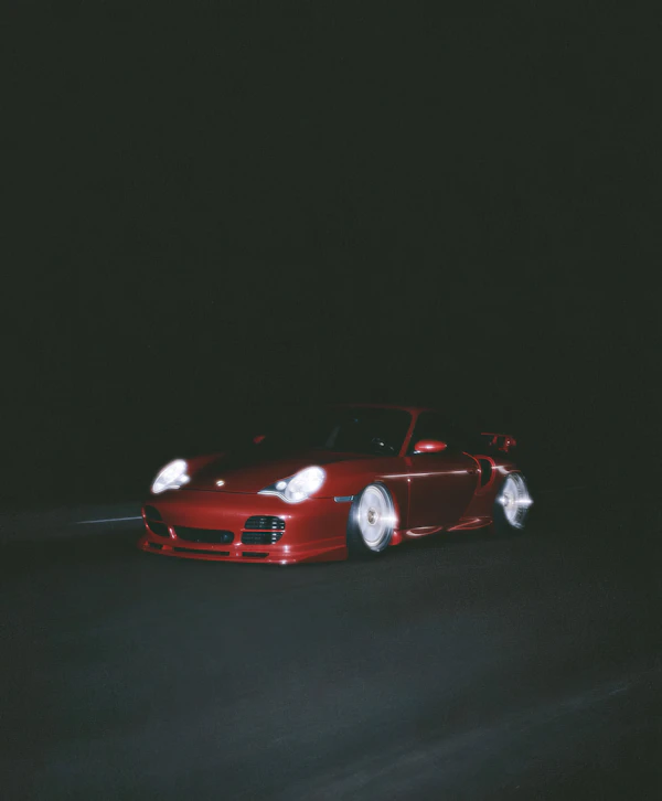 Red Sports Car in Motion