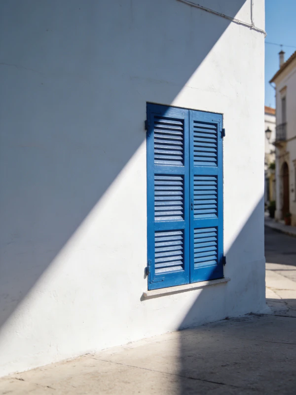 Blue Shuttered Window