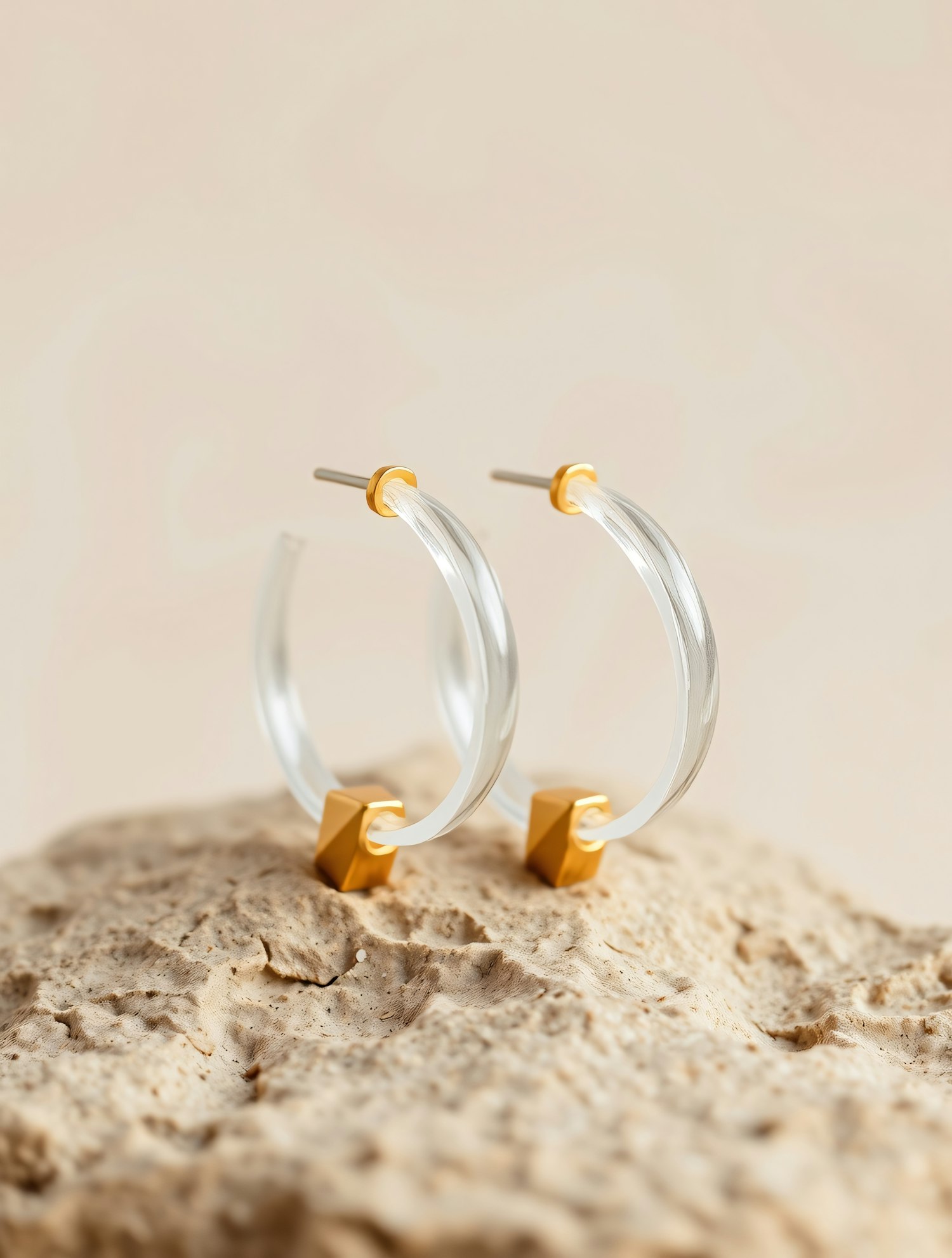 Elegant Hoop Earrings on Stone Surface