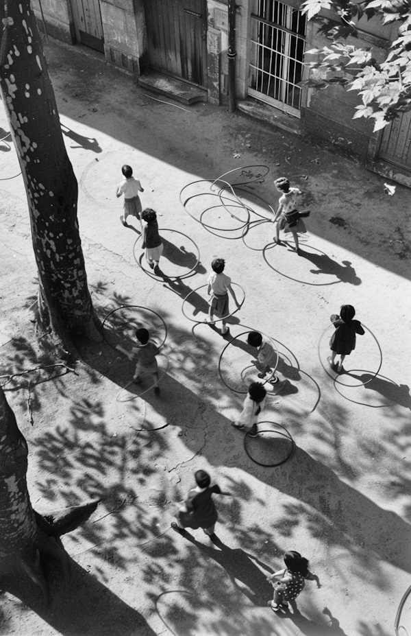 Children Playing with Hoops Outdoors