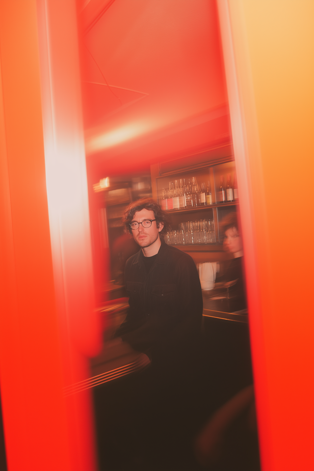 Contemplative Man in Warm Lighting