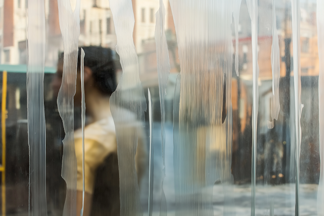 Abstract Figure Behind Glass