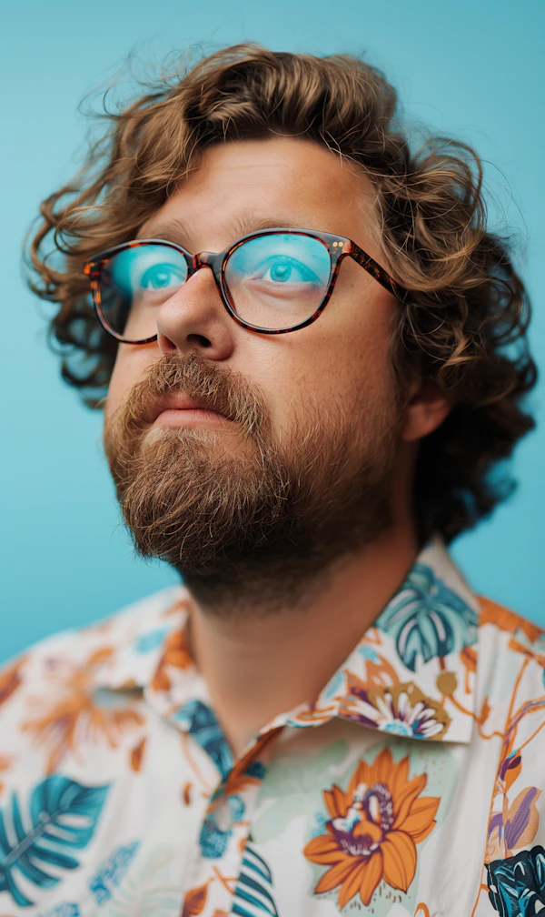Contemplative Man with Stylish Glasses