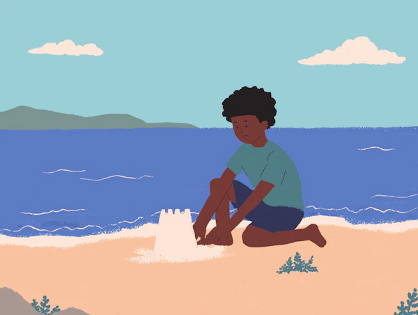 Boy Building Sandcastle