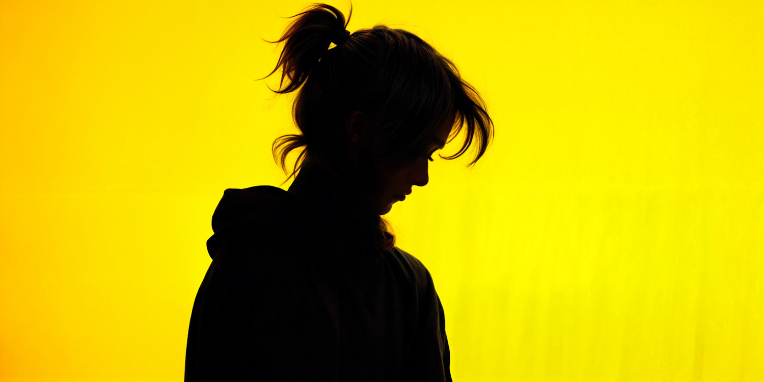 Silhouette Against Yellow